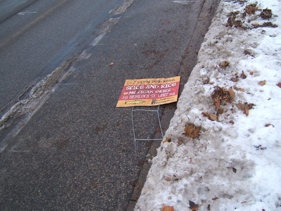 A fallen
sign in the bike lane