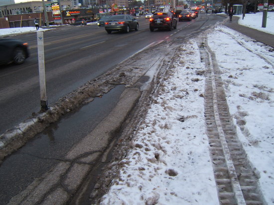 Snow
across the bike lane near King St, cyclist view