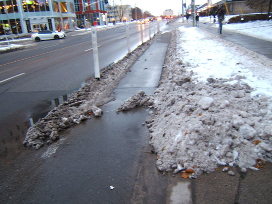 Yet
more snow chunks in the bike lane